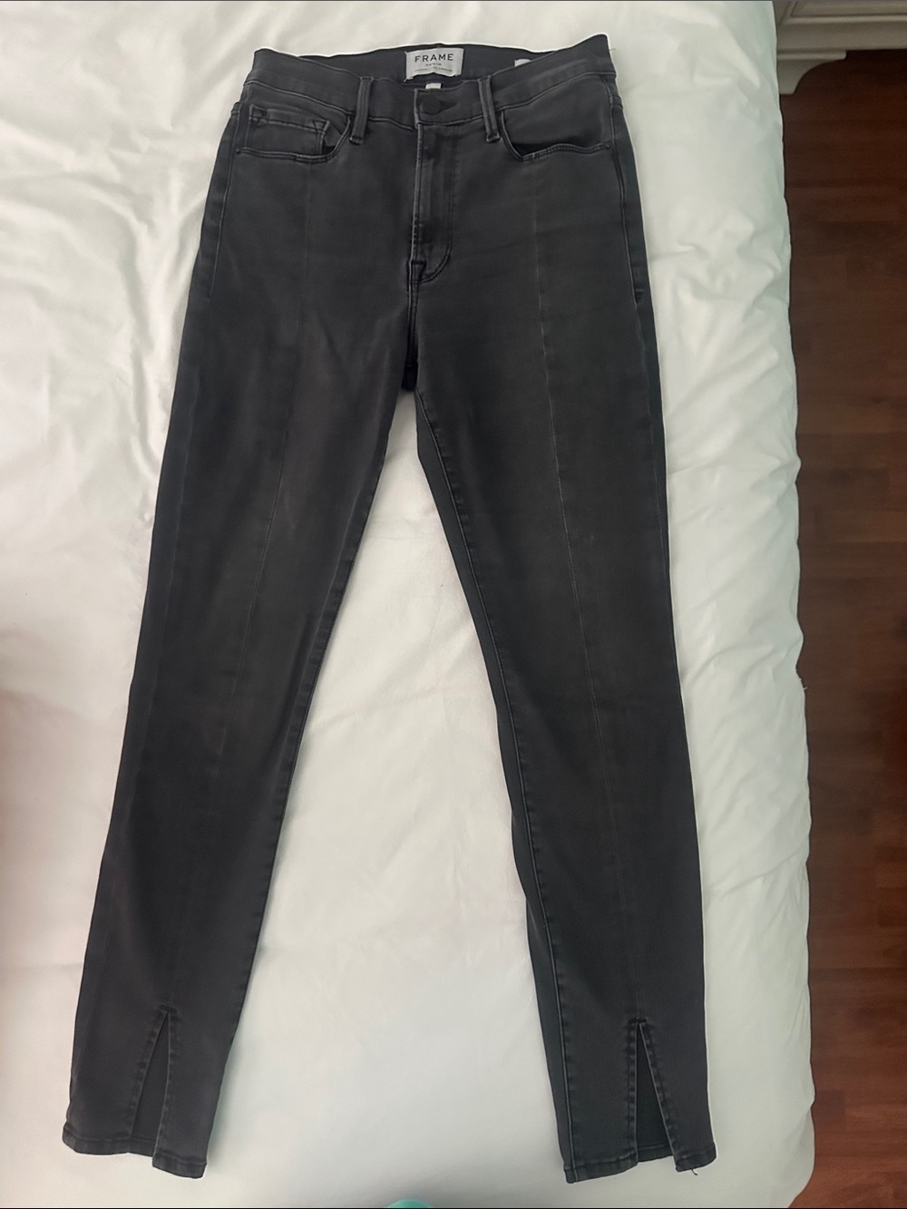 Frame Denim Black High-Rise Skinny Jeans with Front Ankle Slits